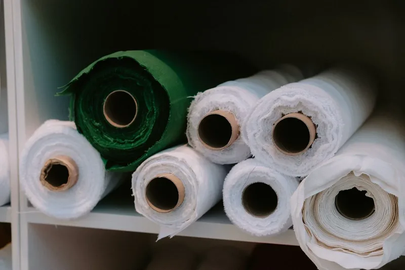 Rolls of fabric in a range of colours and textures